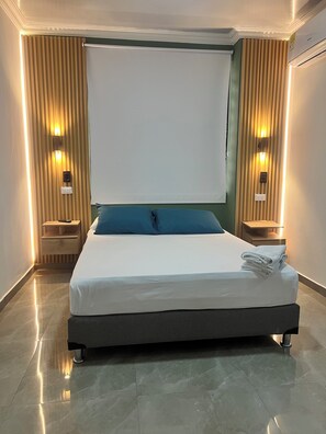 4 habitaciones, escritorio, tabla de planchar con plancha y wifi gratis