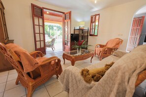 Interior - Villa Alamanda*** by KVZ with view of the national park and the Mamelles mountains (Les Abymes)