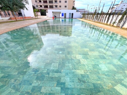 luxury premium apartement in agadir, steps from the beach,pools & fitness center