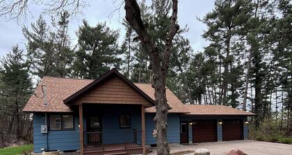 Unique getaway near Pierz Fish Lake with a hot tub and screened porch.