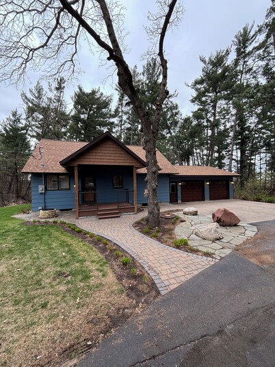 Unique getaway near Pierz Fish Lake with a hot tub and screened porch.