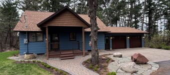 Unique getaway near Pierz Fish Lake with a hot tub and screened porch.