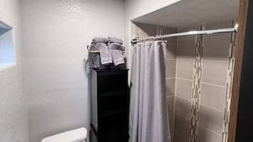Shower, towels, soap, shampoo