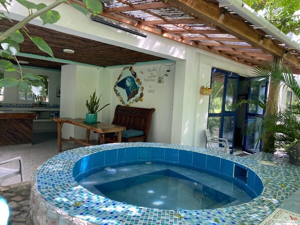 Outdoor dining - Beautiful private cabana with Jacuzzi, just one minute from the beach. (Tierra Bomba)