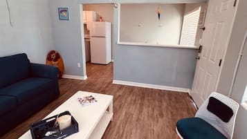 House, Beachside | Living area | Flat-screen TV