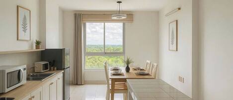 Superior Apartment | Private kitchen | Mini-fridge, stovetop, cookware/dishes/utensils