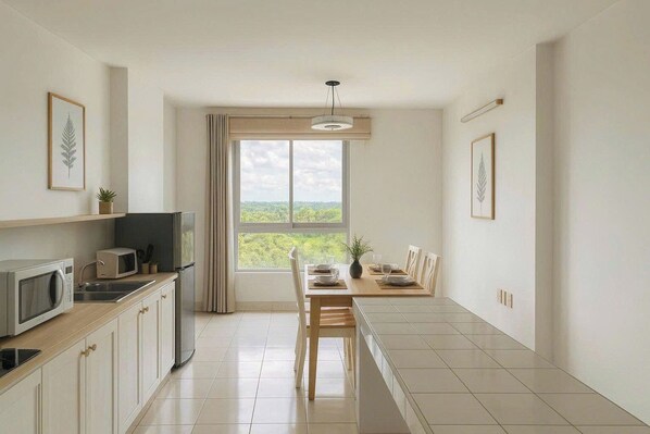 Superior Apartment | Private kitchen | Mini-fridge, stovetop, cookware/dishes/utensils - HD Garden Thu Dau Mot (Thu Dau Mot)