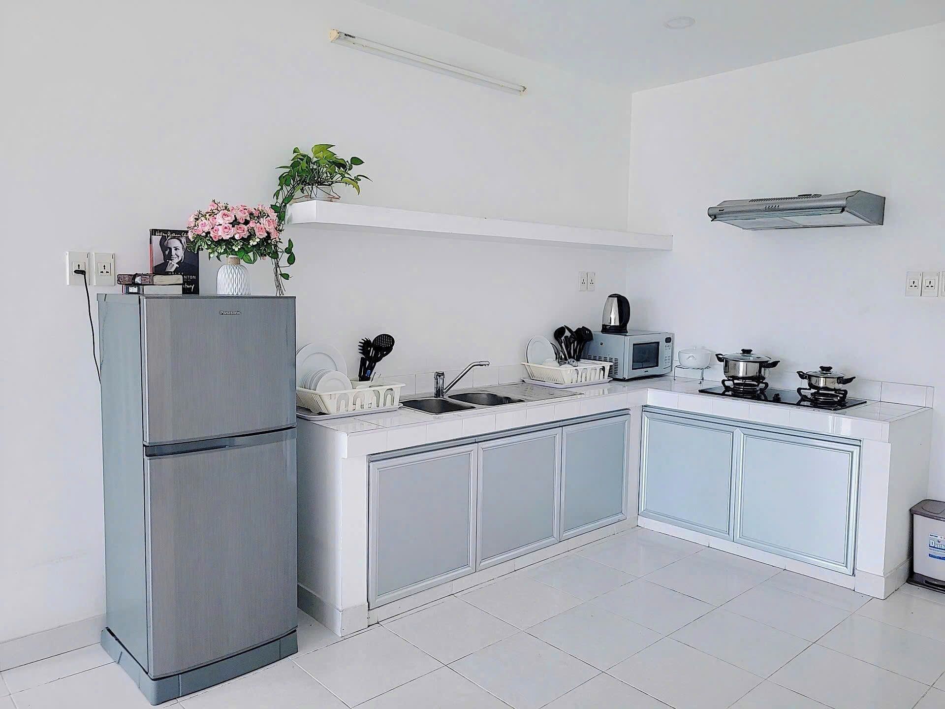 Mini-fridge, stovetop, cookware/dishes/utensils