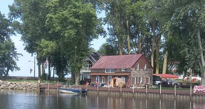 Lakefront 1928 Log Cabin w/ Sauna, Docking, Fishing, Patio, Big Yard & Balcony