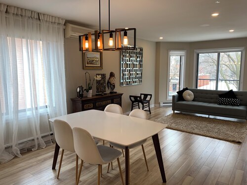 Bright, Renovated & Fully Furnished Condo – Garage + Terrace – 10 min to Metro