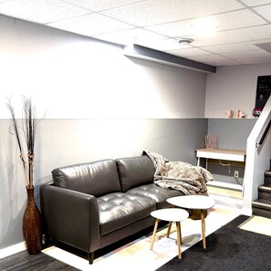 Living area - Family-Friendly 2-Bedroom Unit with Full Bathroom, Living Room, TV & Kitchen (Winnipeg)