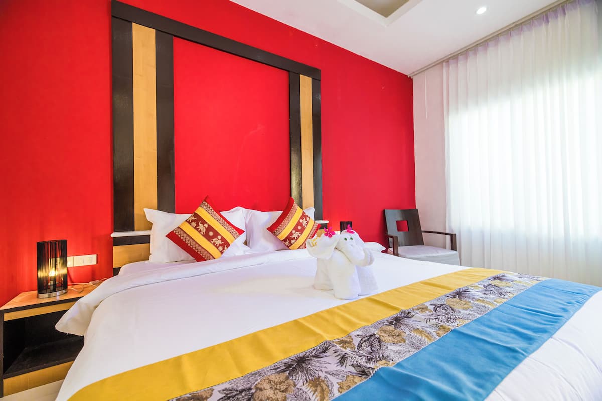 Premium bedding, down duvets, memory-foam beds, in-room safe
