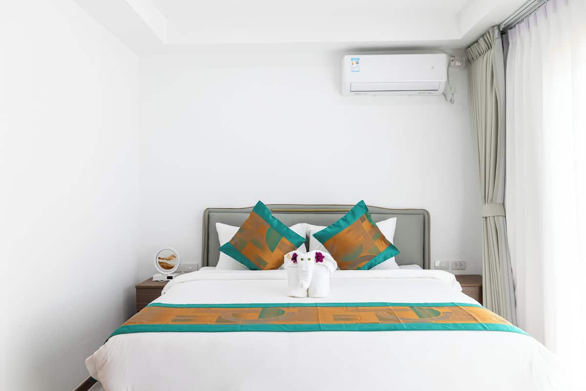 Superior Double Room, Balcony, Resort View | Living area | 65-inch Smart TV with digital channels