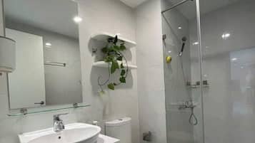 Basic Room, City View | In-room safe, desk, laptop workspace, blackout drapes