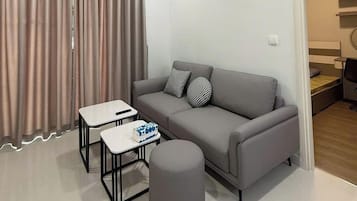 Basic Room, City View | In-room safe, desk, laptop workspace, blackout drapes