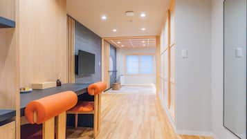 Family Suite, 2 Bedrooms, Non Smoking, Private Bathroom | Living area | 50-inch Smart TV with digital channels