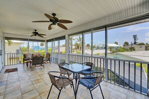 Outdoor dining - Sun Soaked Coastal Getaway, Private Heated Pool, Steps to Sugar Sand Beach! (Fort Myers Beach)