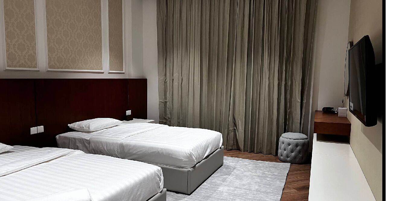 Kamar Twin Deluks | Brankas, setrika/meja setrika, dan Wi-Fi gratis