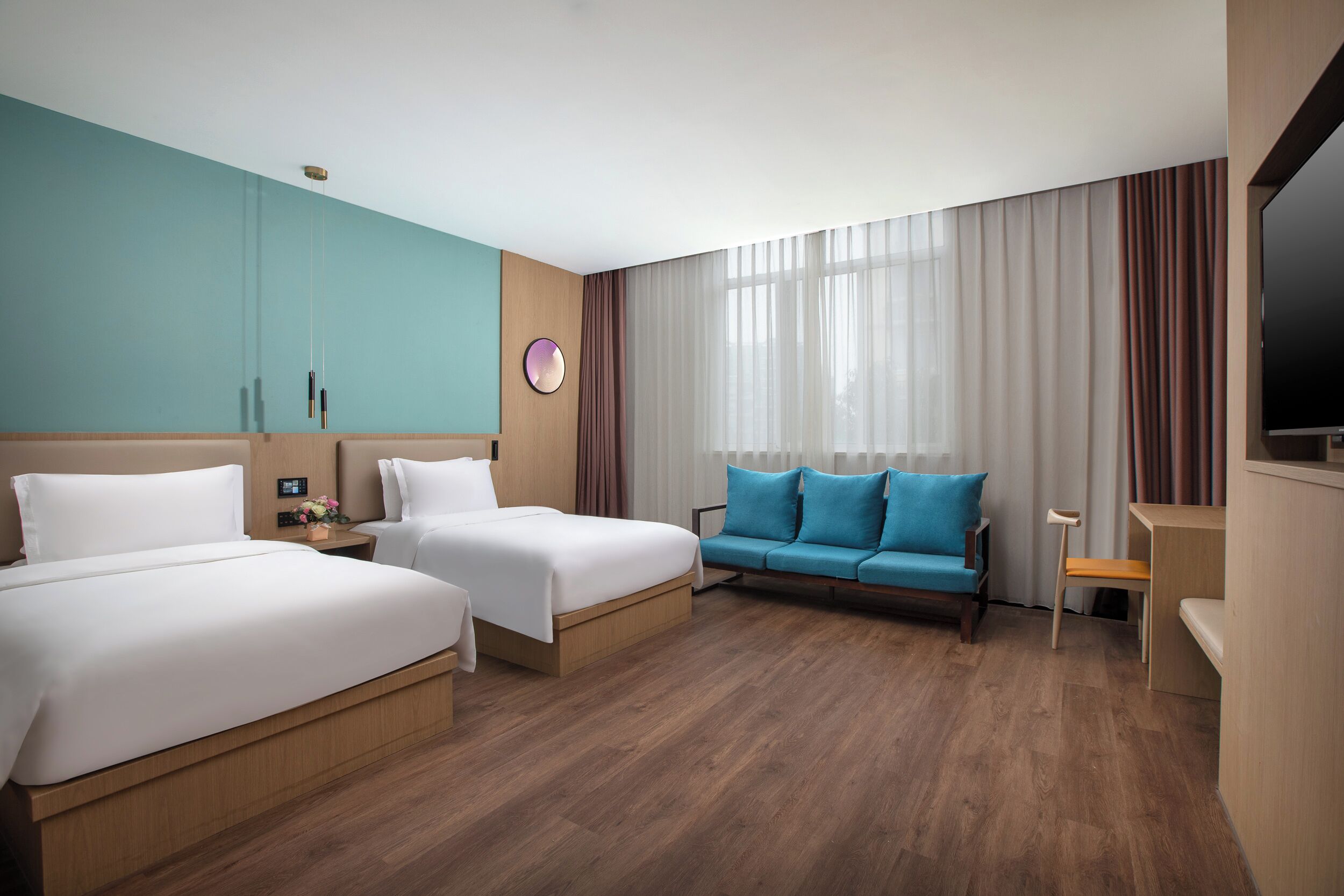 Family Room | Desk, laptop workspace, blackout curtains, iron/ironing board