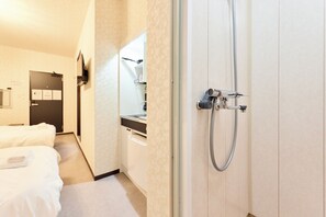 Basic Double or Twin Room | Bathroom | Shower, hair dryer, towels, soap - Shinsaibashi Cozy House (Osaka)