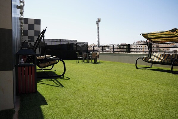 Property grounds - almansi Hotels (amman)