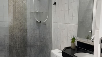 Shower, free toiletries, towels, soap