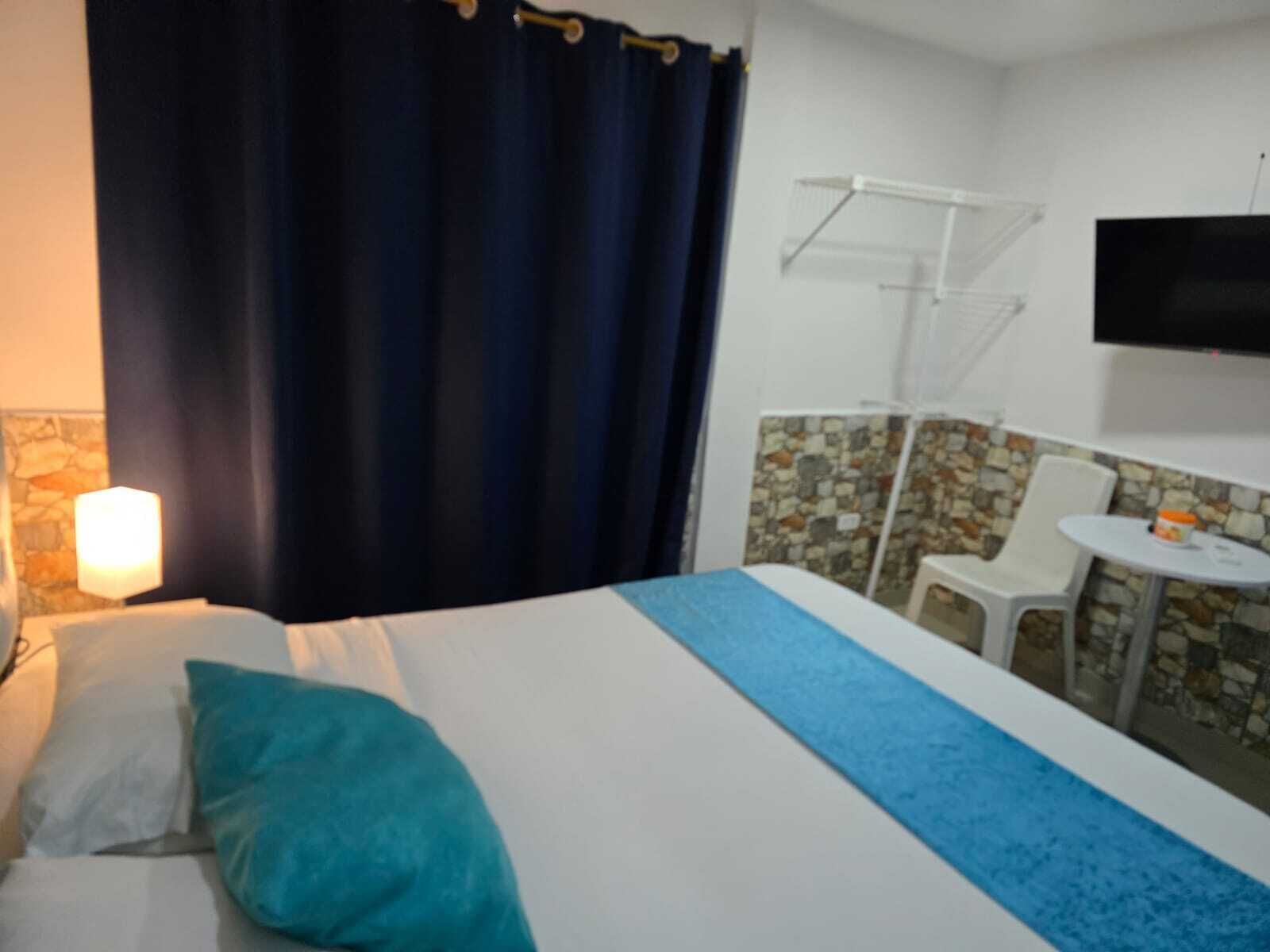 Basic Room, Pool View | Iron/ironing board, free WiFi, bed sheets