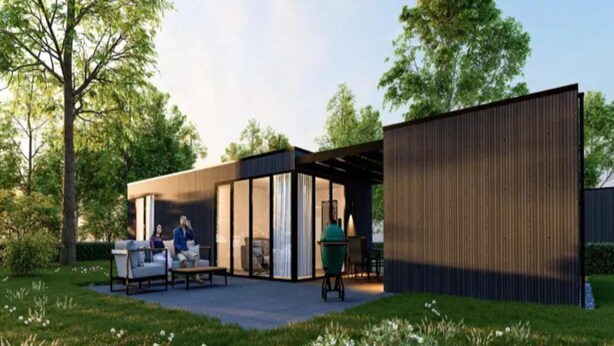 A modern outdoor patio with a seating area, a grill, and a wooden structure. - Holiday Home by Palette Resort De-steppe (Ulicoten)