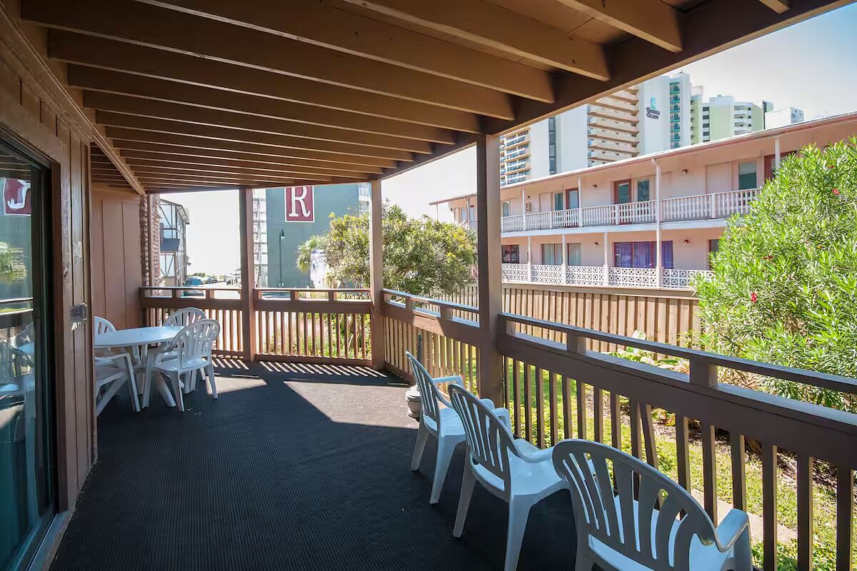 Sip morning coffee under shade on the spacious deck.