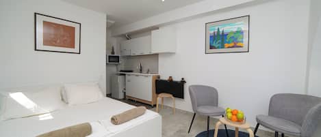 Appartement, terras, uitzicht op tuin | Verduisterende gordijnen, een strijkplank/strijkijzer, gratis wifi