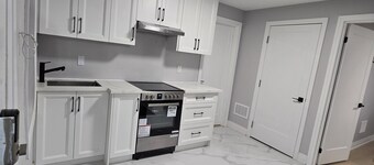 Walk to the Falls! 2BR Modern Home Base + Free Parking & Laundry