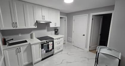 Walk to the Falls! 2BR Modern Home Base + Free Parking & Laundry