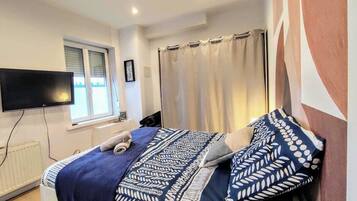 1 chambre, fer et planche à repasser, Wi-Fi, draps fournis