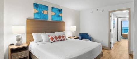 Wake up to ocean horizons from your serene king retreat.