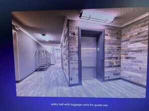 An entry hall with luggage carts for guest use. - Perfect 3-bedroom condo in enchanting Park City for your getaway (Park City)