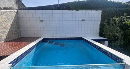 Cozy and charming house 300 meters from Indaiá Beach, in Bertioga.