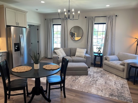 TV. The Loft at East Main – Trendy Upstairs Retreat with Small Town Vibes