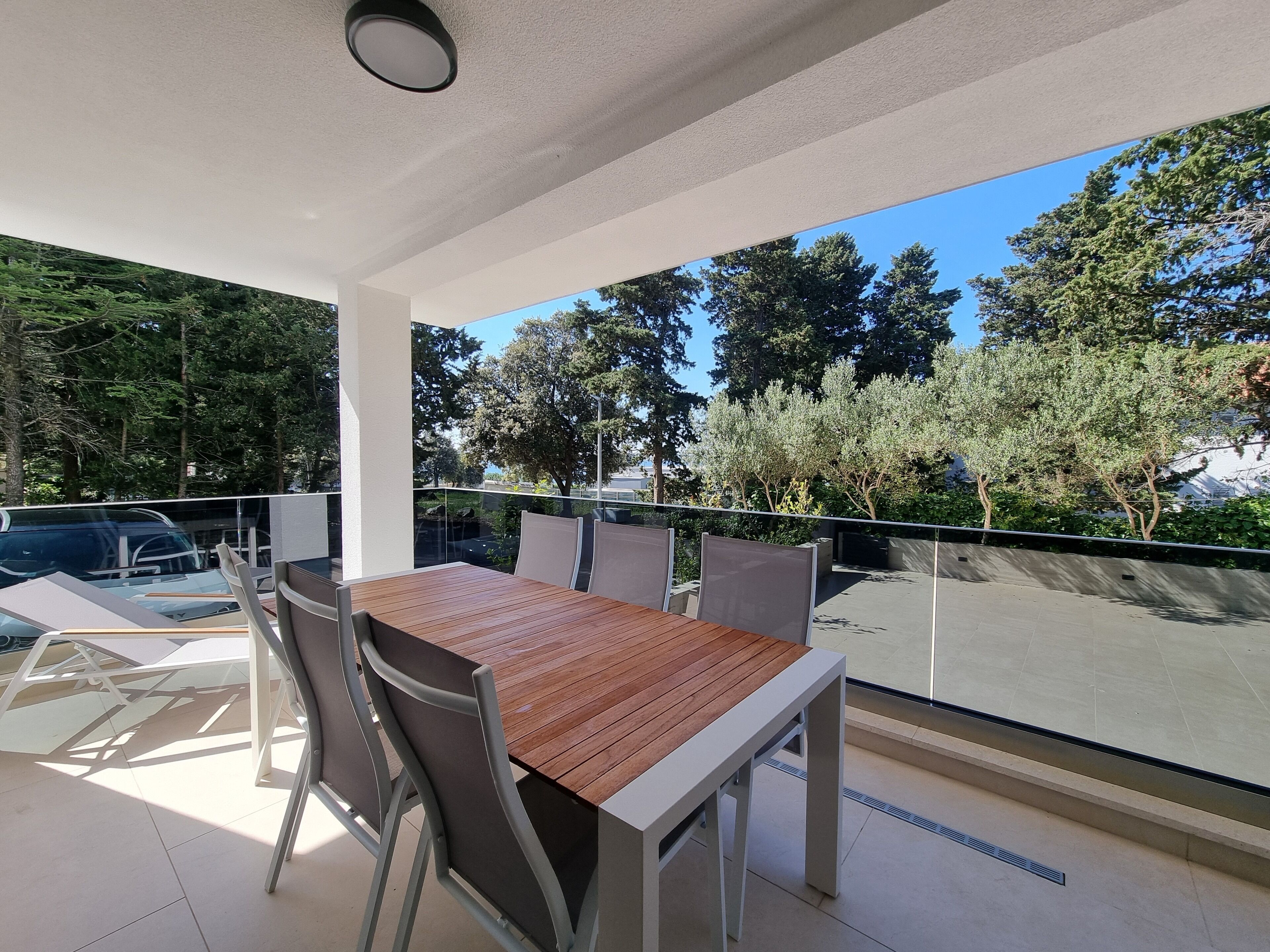 Luxe appartement, uitzicht op zwembad, aan het strand | Buiten dineren