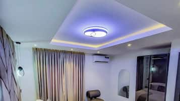 Desk, laptop workspace, blackout drapes, soundproofing