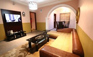 Deluxe Room, Balcony, City View | Ruang tamu