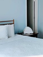 Desk, laptop workspace, free WiFi, bed sheets