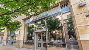A storefront with a sign reading "LETENA Ethiopian Cuisine."