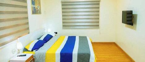 Family Apartment, Balcony, City View | In-room safe, desk, laptop workspace, blackout drapes