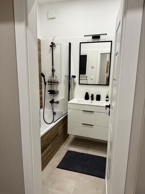 Hair dryer, towels, soap, shampoo