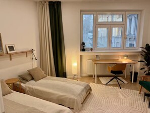 2 bedrooms, desk, iron/ironing board, travel crib