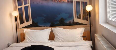 1 dormitorio, tabla de planchar con plancha, wifi y ropa de cama