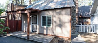 Romantic one bedroom, one bath cabin with white picket fence in.
Extremely cozy.