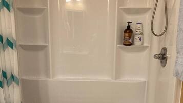 Hair dryer, towels, soap, toilet paper