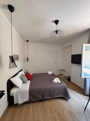 2 chambres, fer et planche à repasser, Wi-Fi, draps fournis