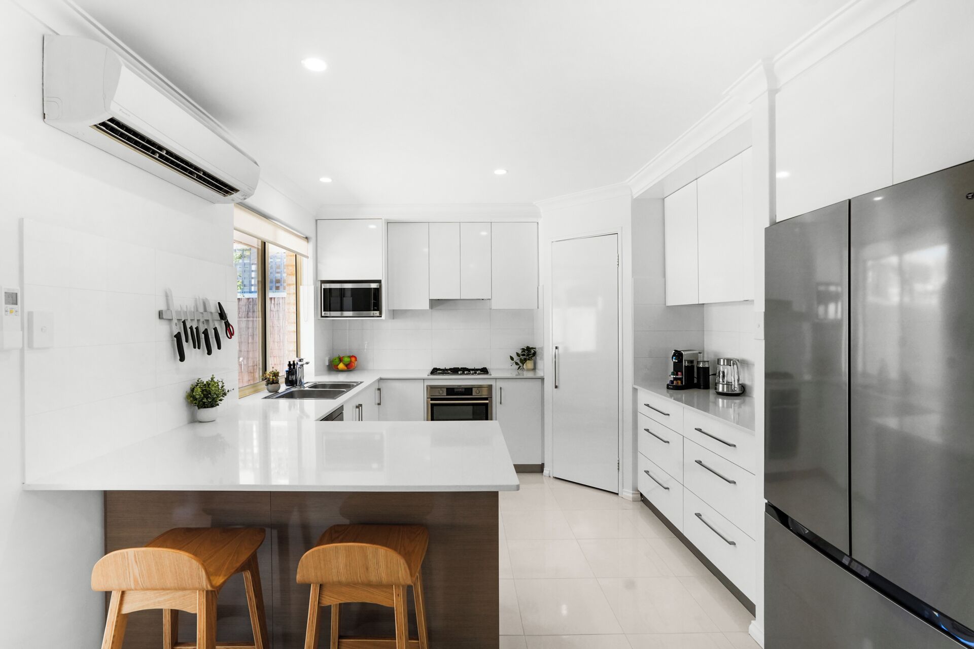 Sleek appliances and plenty of bench space.
